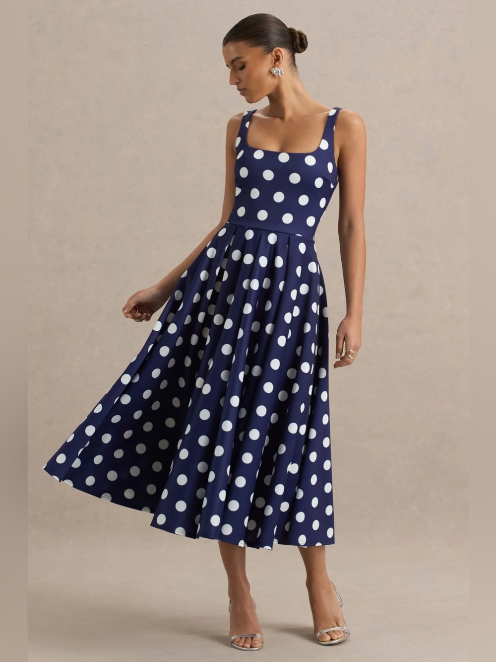 WAYF Polka Dot Corset Midi Dress. It features a retro-inspired square neck